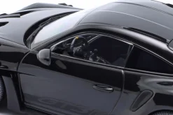 Porsche 911 (992) GT3 RS Baujahr 2023 schwarz / rote Felgen 1:18 Minichamps