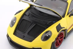 Porsche 911 (992) GT3 RS Weissach-Paket 2024 gelb / rote Felgen 1:18 Minichamps