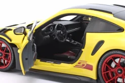 Porsche 911 (992) GT3 RS Weissach-Paket 2024 gelb / rote Felgen 1:18 Minichamps