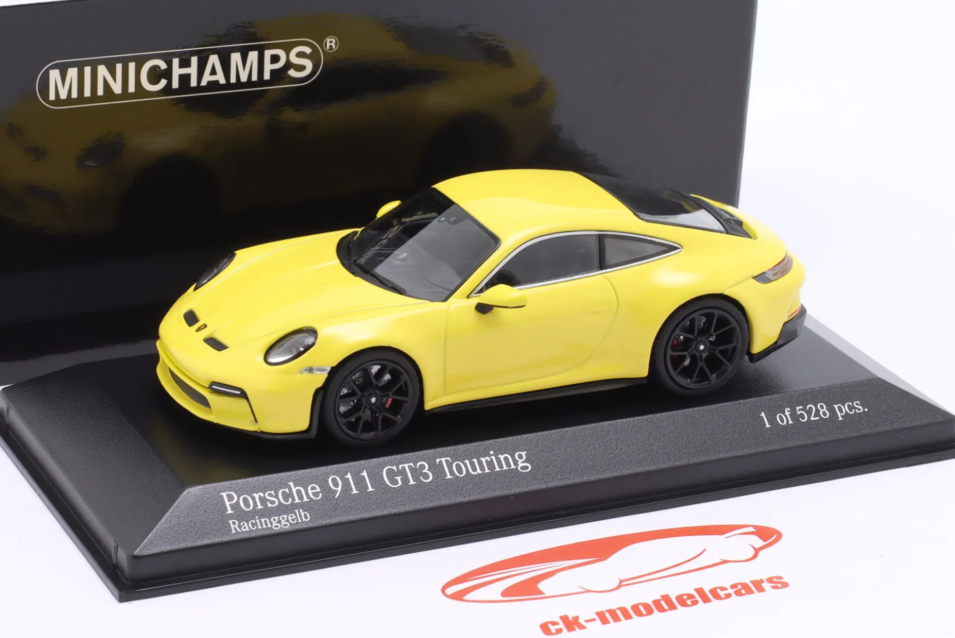Porsche 911 (992) GT3 Touring 2021 racing gelb / schwarze Felgen 1:43 Minichamps