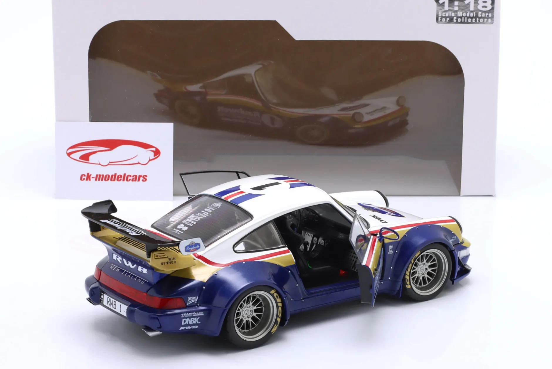 Porsche 911 (964) RWB Rauh-Welt 2022 blau / weiß / rot / gold 1:18 Solido