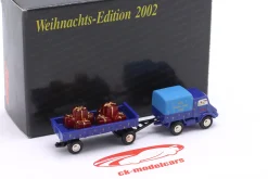 Unimog 401 mit Ladegut Weihnachts-Edition 2002 1:90 Schuco Piccolo